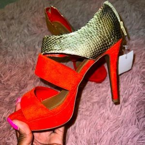 Cute orange and gold heels! Never been worn.